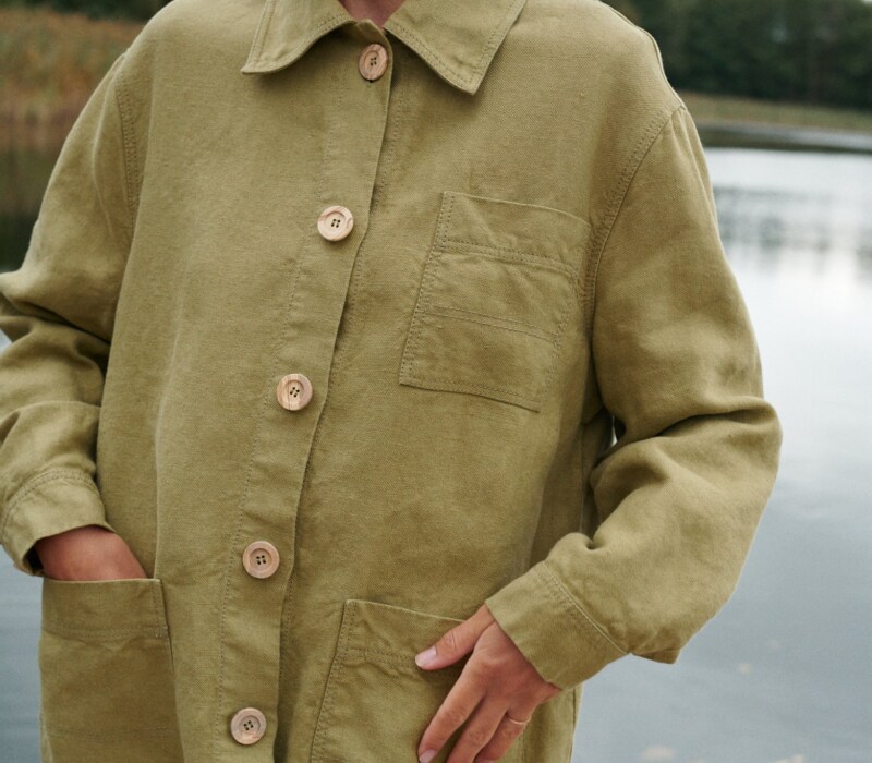 Olive linen chore jacket with patch pockets and button front