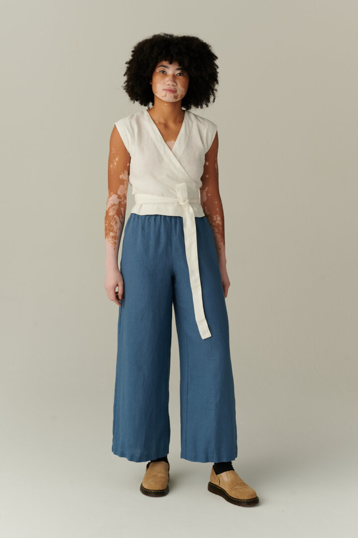 women is wearing wide-leg blue linen pants