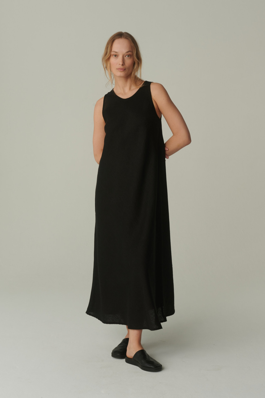 women is wearing black bias cut dress