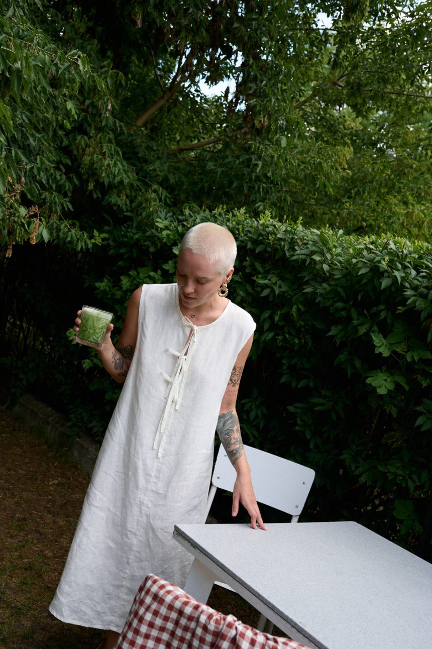 women is wearing off white linen dress