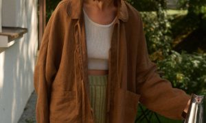 Linenfox model is wearing brown linen jacket