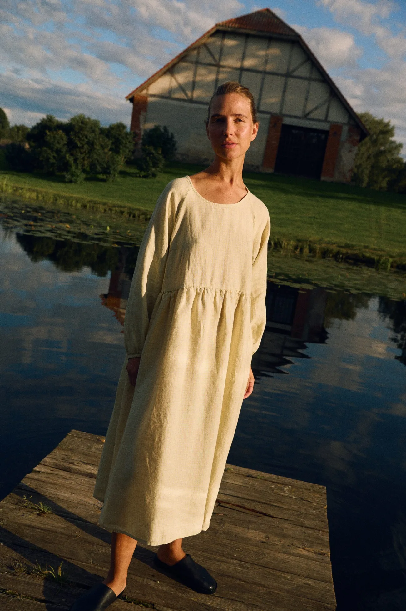Apple checks linen midi dress with long sleeves and gathered waist styled outdoors