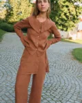 Front view of mocha mousse linen blouse with statement collar and relaxed fit, styled with matching linen pants with an overskirt
