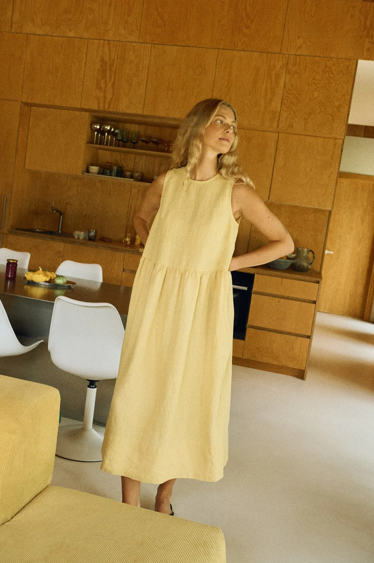 Butter yellow sleeveless smock linen dress full body on model