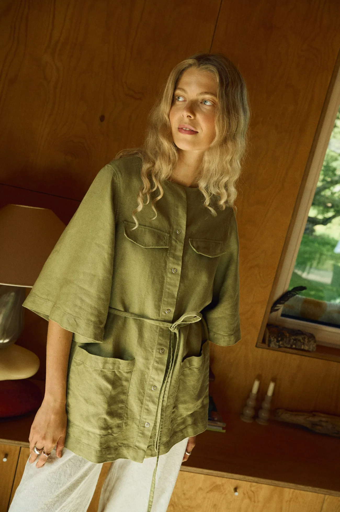 Olive linen snap-closure overshirt with relaxed fit, 3/4 sleeves, and pockets