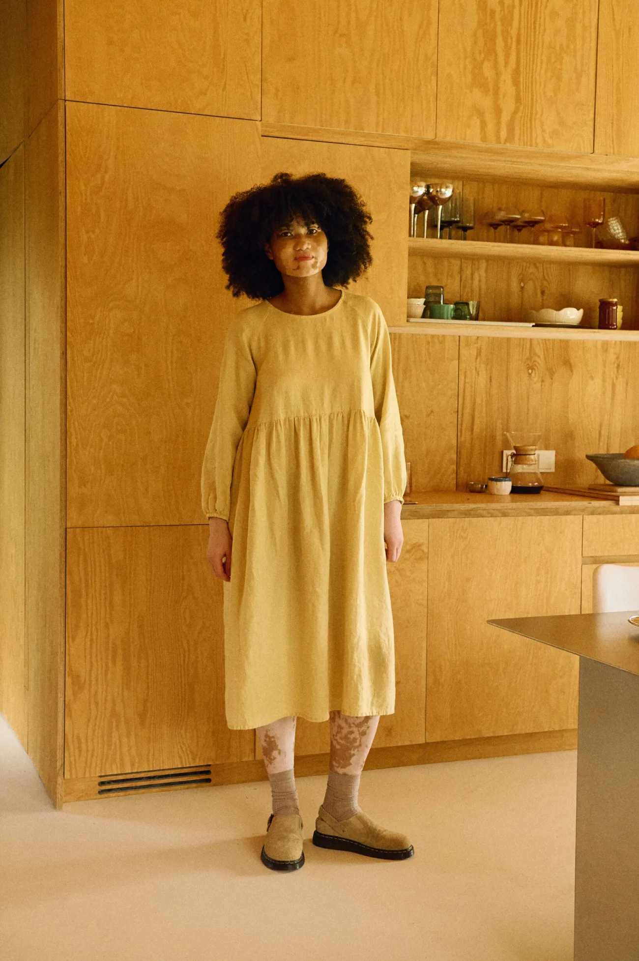 Flattering high-waist bodice and full maxi skirt on the butter linen Margo dress