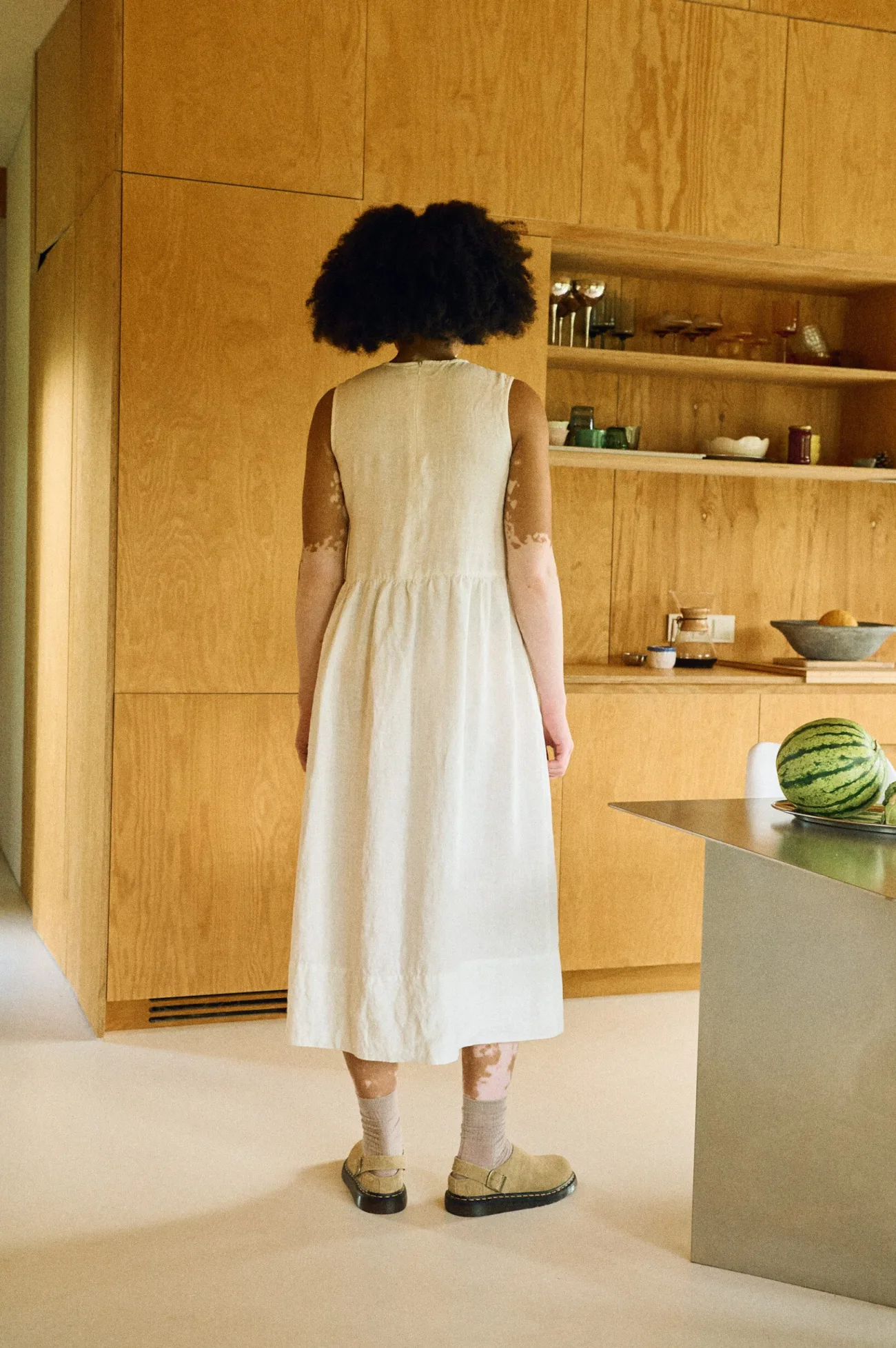 Milky white linen sleeveless dress back view with hidden zipper closure