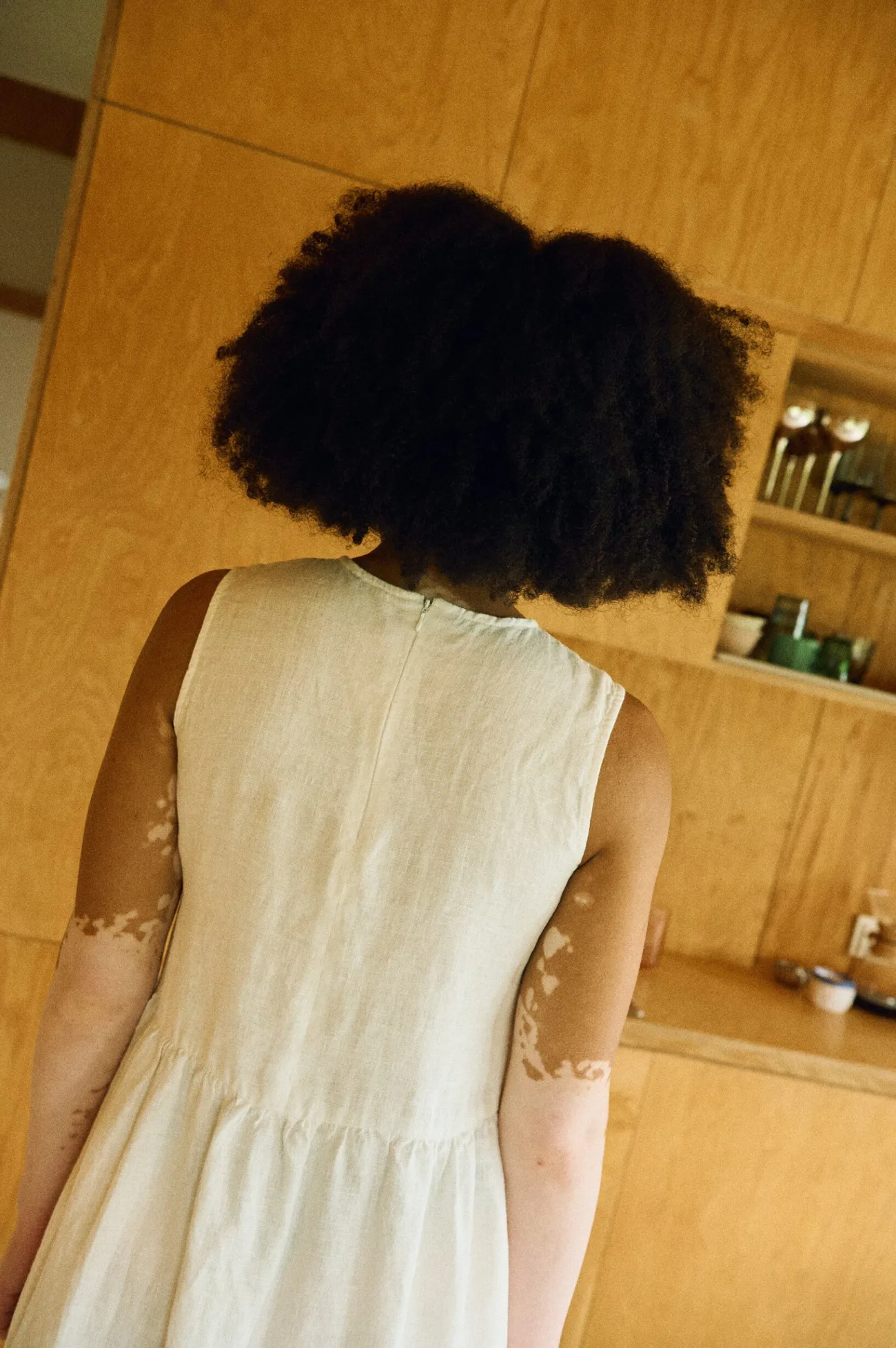 Milky white smock linen dress rear view showing minimalist design