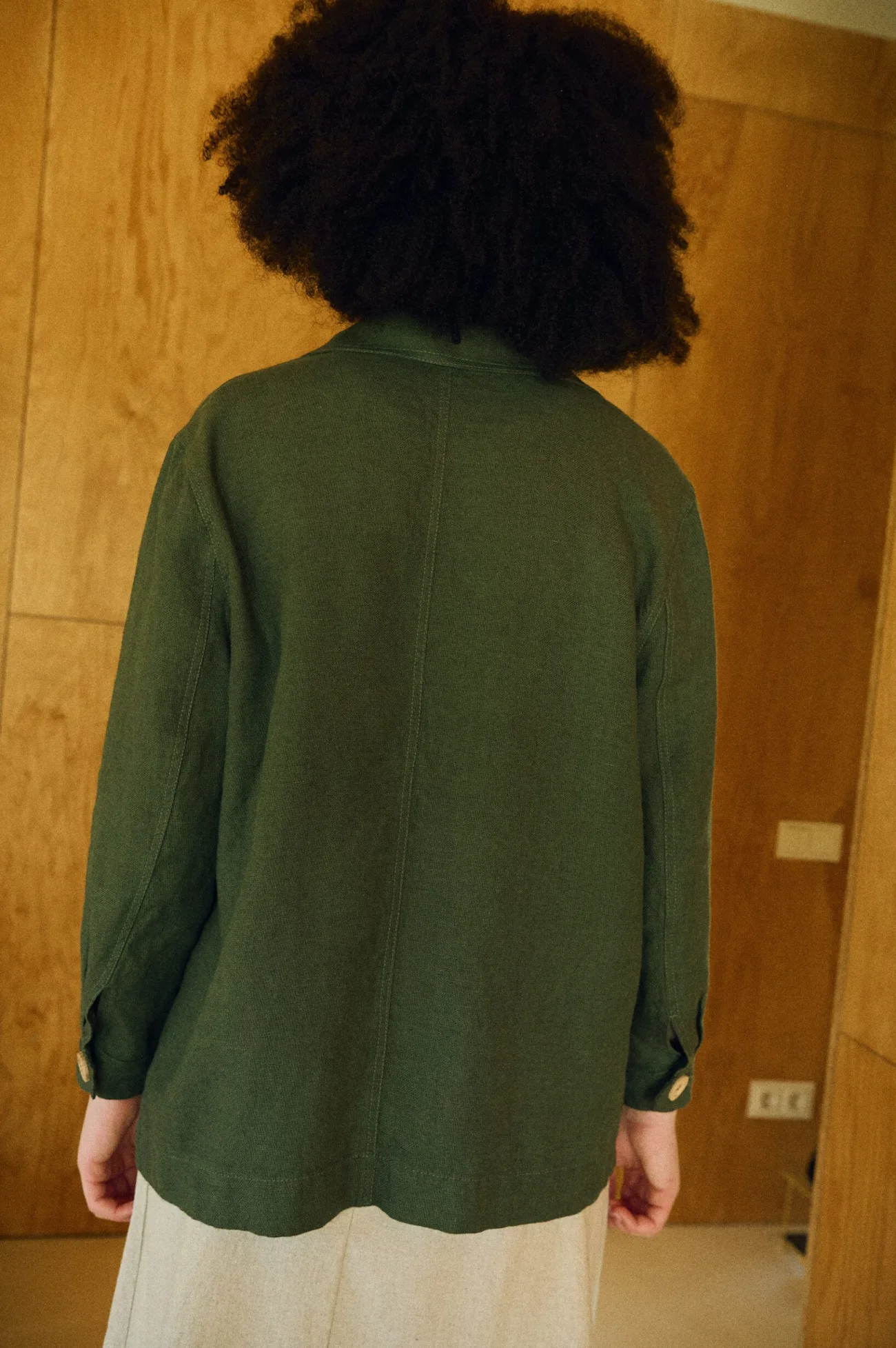 Back view of the green linen-wool jacket