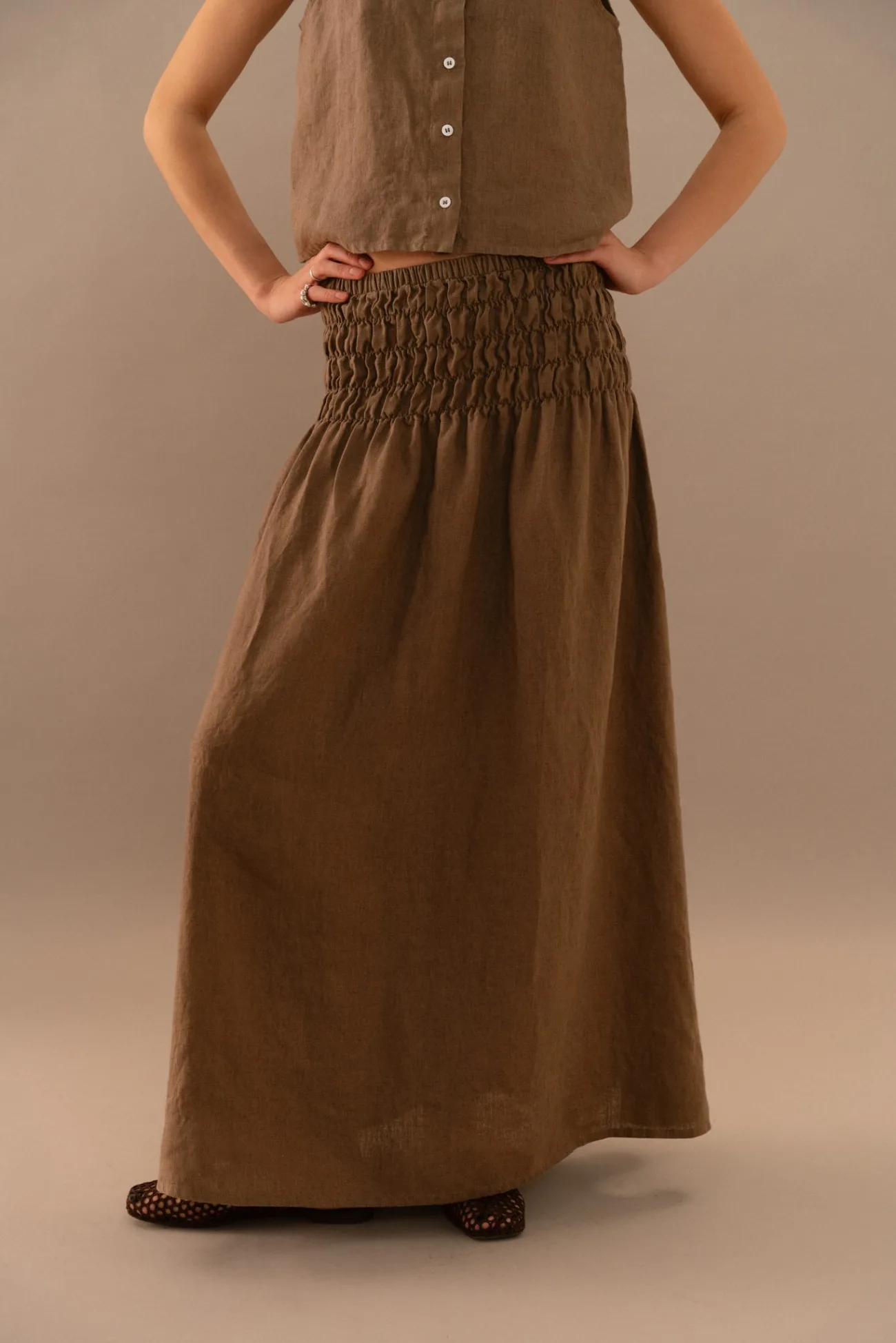 Cacao linen maxi skirt with wide smocked elastic waistband and relaxed flowing silhouette