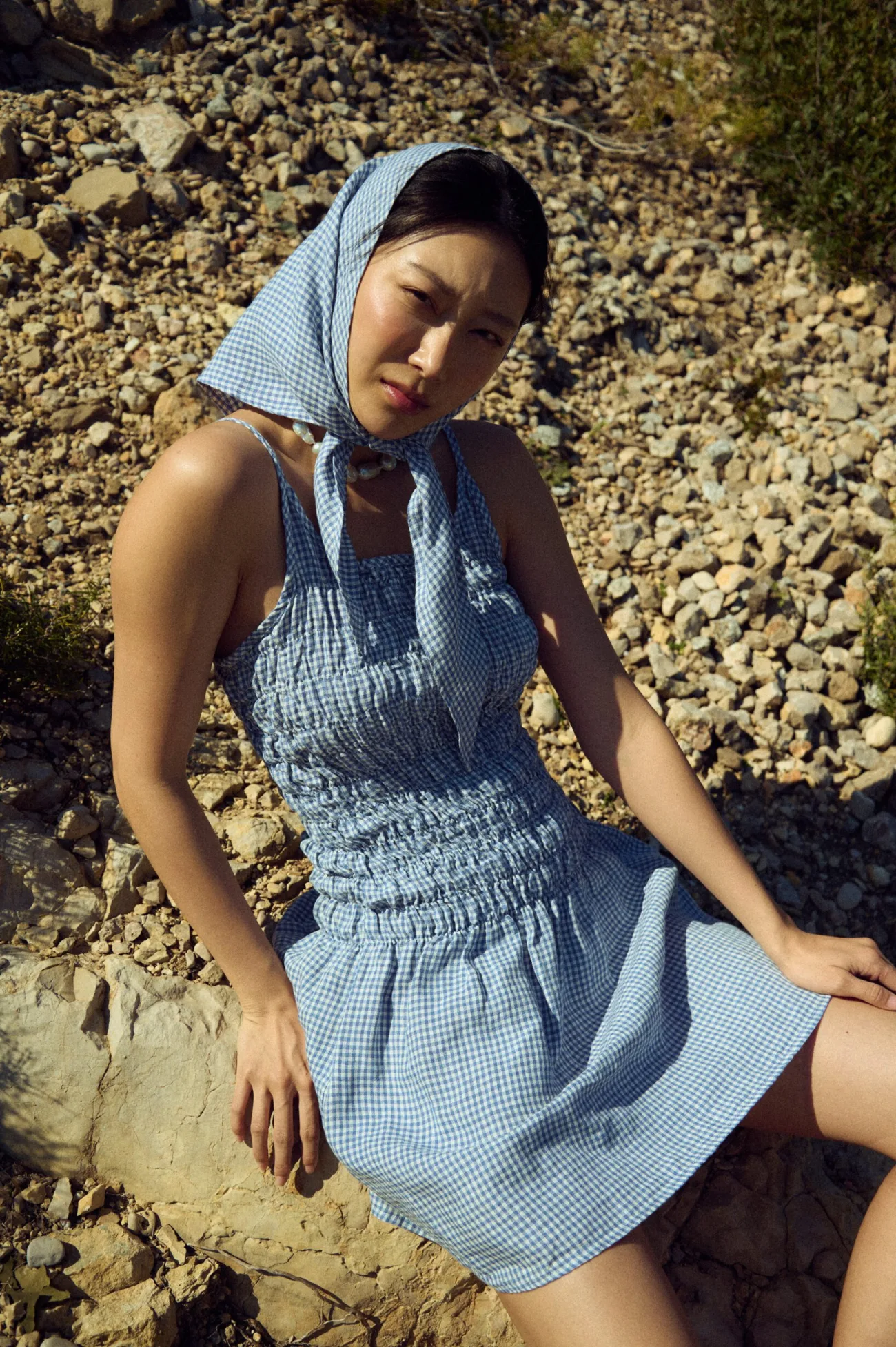 Soft blue mini gingham linen summer dress with delicate straps and a matching triangular scarf