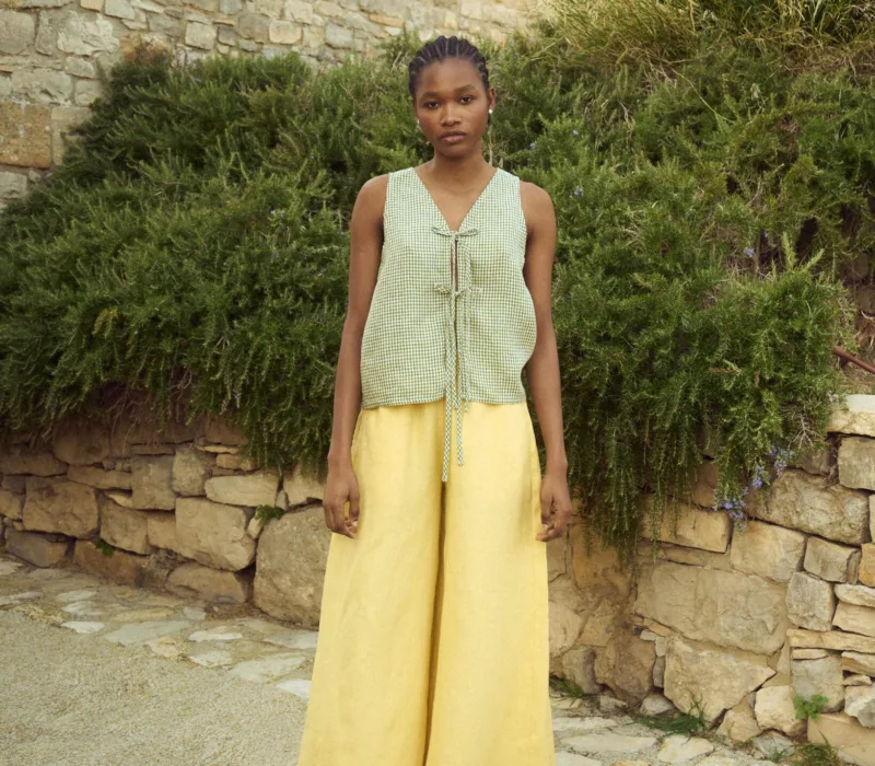 model in gingham linen tie front top and wide butter linen culottes
