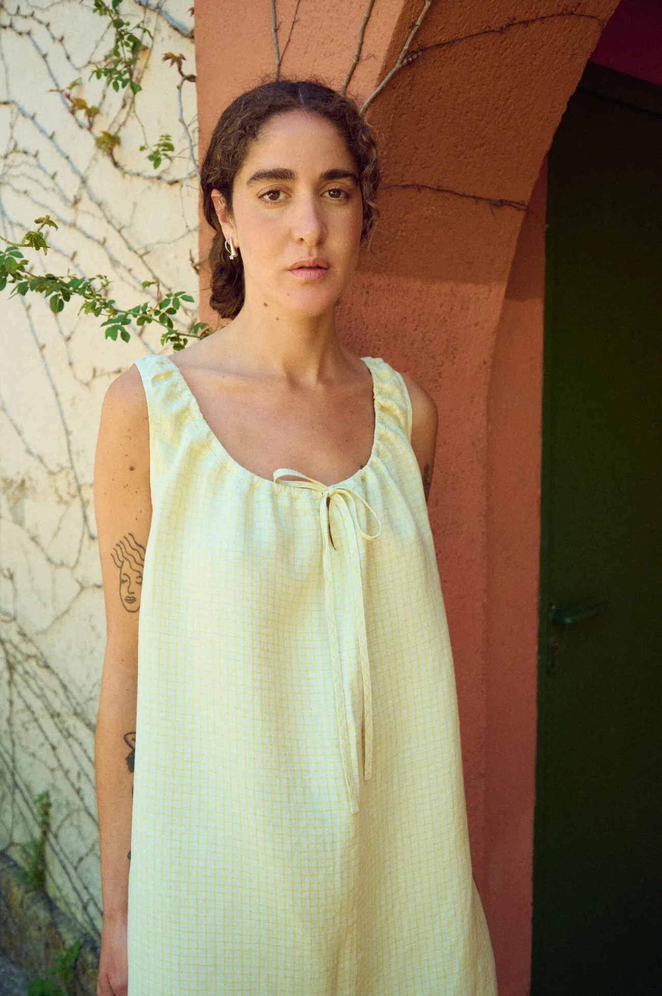 close-up of mini dress for summer in checked linen fabric
