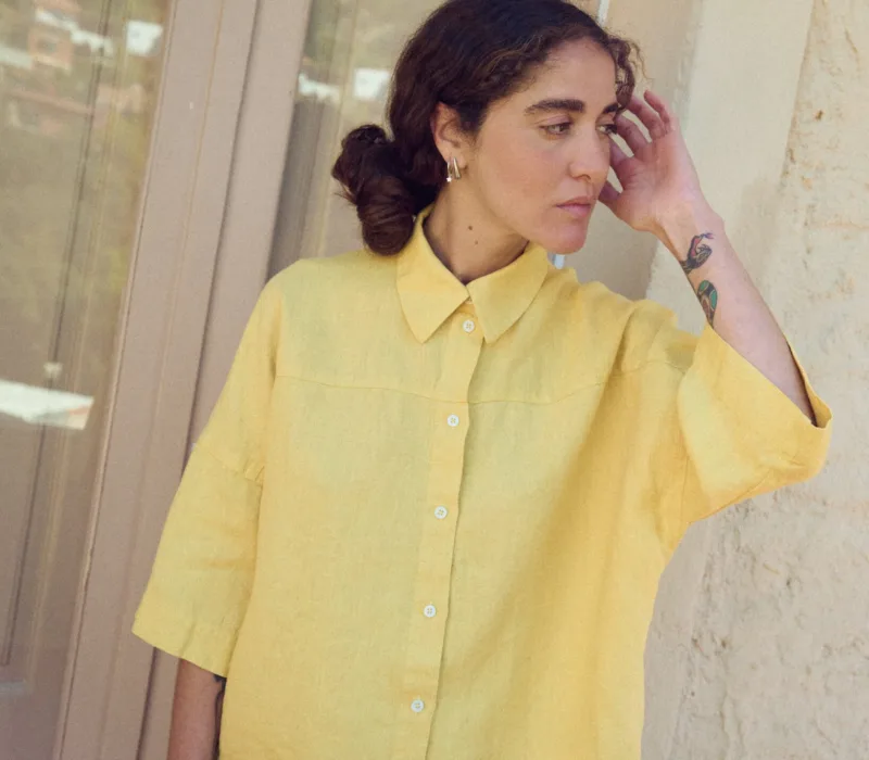Oversized linen shirt with relaxed fit and button front