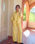 Summer linen pants in a long wide leg silhouette with lace inserts and side pockets