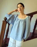 Blue gingham blouse with raglan sleeves and lace neckline