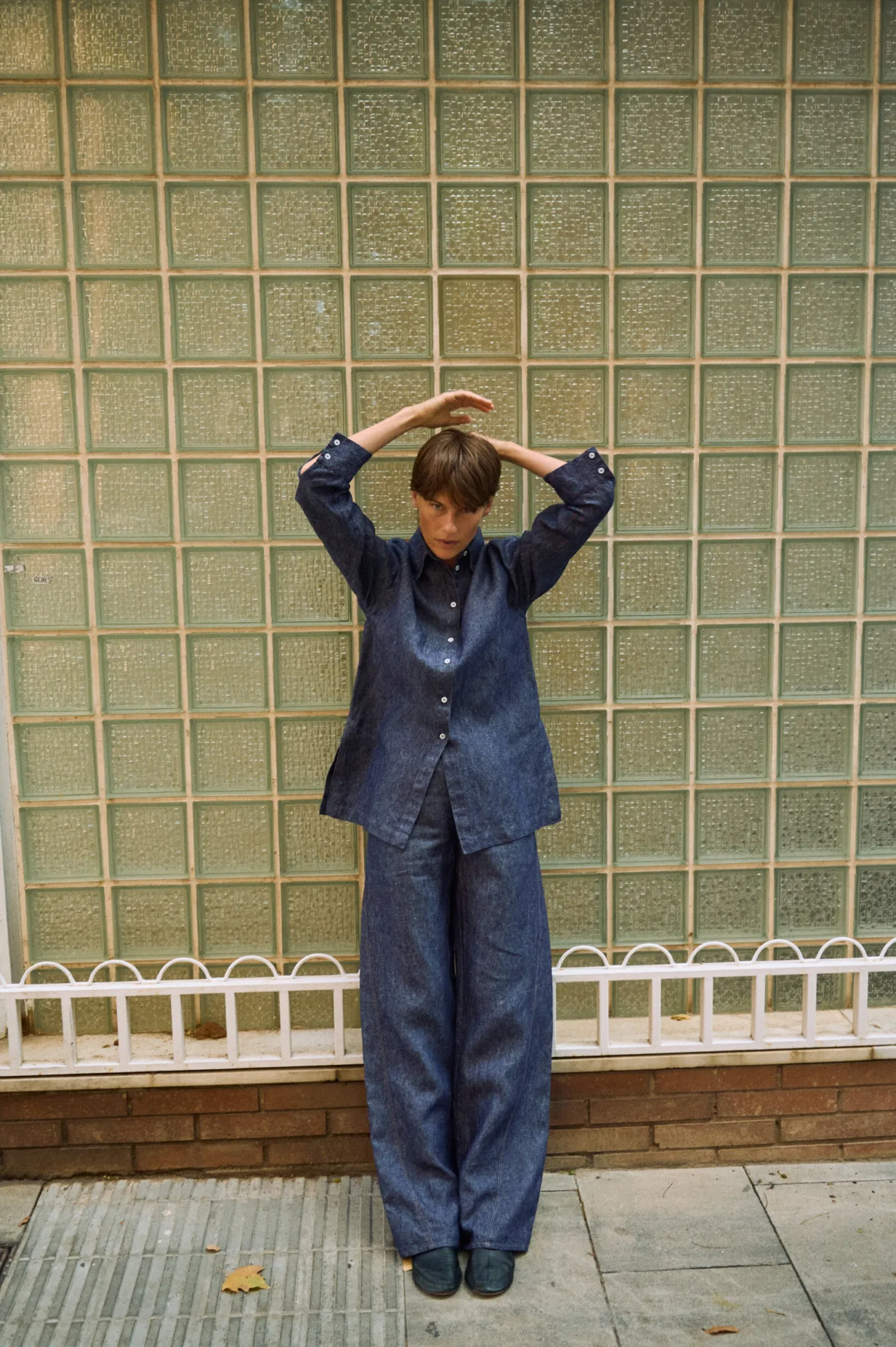 Blue denim linen pants with wide legs, styled with a matching button-down linen shirt