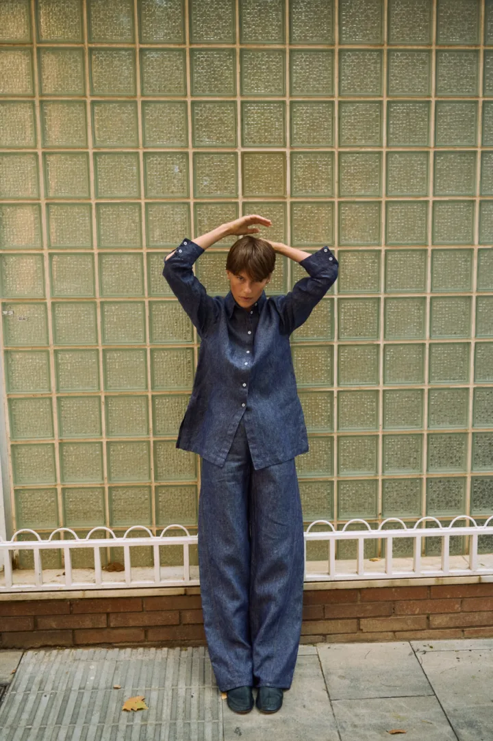 Blue denim linen pants with wide legs, styled with a matching button-down linen shirt